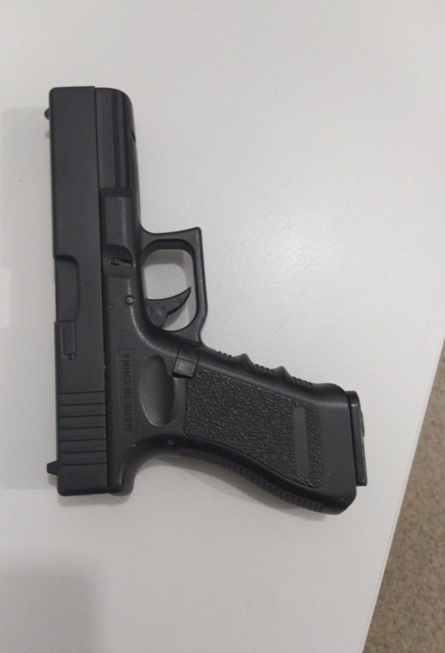 Arma encontrada com o acusado